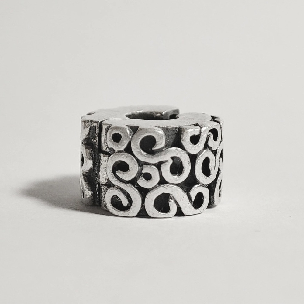 retired Pandora s clip swirls bracelet charm stopper